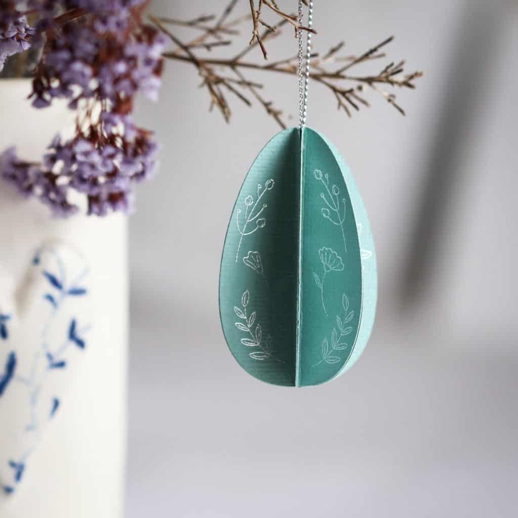 Turquoise paper egg with foil details